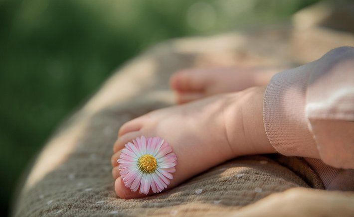 Why Walking Barefoot on Grass Feels So Good — And What It Might Do for You